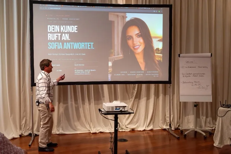 Live-Demo auf der Bühne, Leinwand und Flipchart